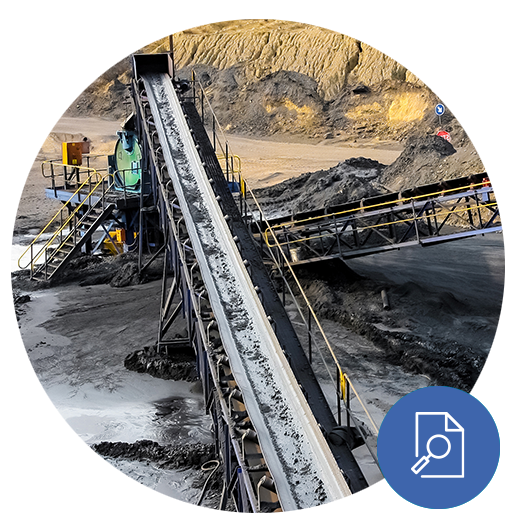 Belt object detection An industrial conveyor belt transports raw materials through a mining site, illustrating automated material handling in a rugged environment.